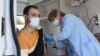 A man is vaccinated against coronavirus at a mobile vaccination center in Yerevan last month.