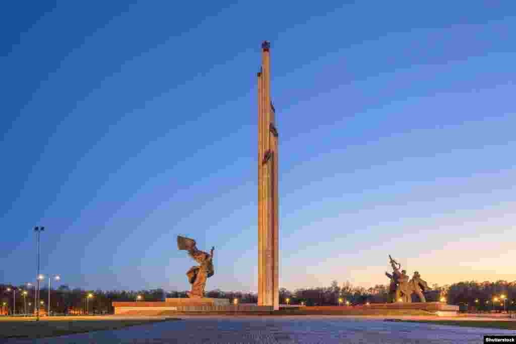 Riga’s Monument to the Liberators of Soviet Latvia and Riga from the German Fascist Invaders. The 79-meter-high obelisk at the center of the complex was toppled in August 2022. The park was reopened in November 2023 after extensive remodeling that saw the installation of a skate park and walkways.