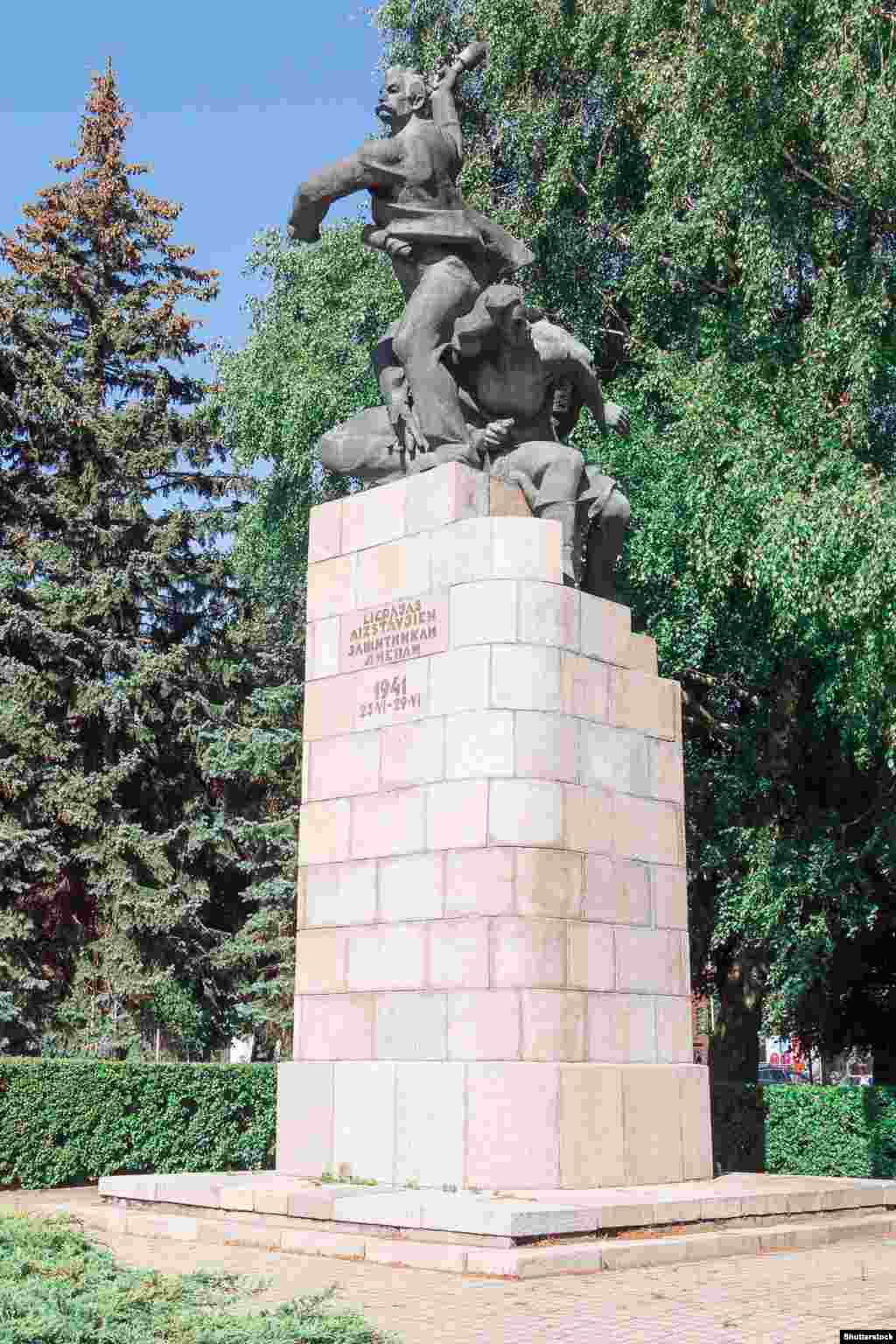 The Defenders of Liepaja monument in western Latvia, photographed in September 2022. The statue, dubbed the “grenade thrower,” depicted a worker fighting the 1941 Nazi invasion of Latvia alongside a Soviet sailor and paramedic. The monument was taken down in October 2022.