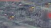 Drone Footage Appears To Show Russian Soldiers Using Ukrainian POWs As Human Shields