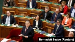 Hungarian Prime Minister Viktor Orban addresses the parliament in Budapest on December 13.