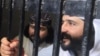 حنیف پښتین (ښي لاس ته ) له تېرو څه کم څلورو کلونو راهیسې په زندان کې دی ـ انځور له ارشيفه