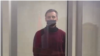 Aleh Hruzdzilovich in court in Minsk on March 2.