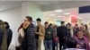 Russians line up to get a Kazakh individual dentification number at a public service center in Aqtobe late last month. 