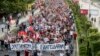 Thousands of people march at a rally in Skopje on July 6 protesting against the compromise proposal aimed at ending the dispute with Bulgaria and opening negotiations for EU membership.