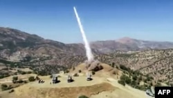 This video grab from September 29 reportedly shows a missile launch from the Iranian Kurdistan (Komalah) region directed toward Sulaimaniyah in Iraq's autonomous Kurdistan region.
