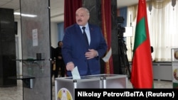 Alyaksandr Lukashenka casts his ballot in the referendum on the constitutional amendments in Minsk on February 27.