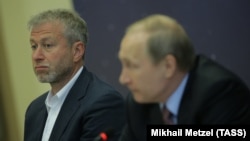 Billionaire Roman Abramovich (left), pictured with Russian President Vladimir Putin in 2016, was sanctioned for what the EU said was "privileged access" to the Kremlin.