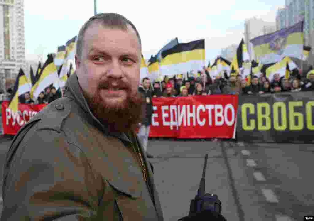 Russian nationalist leader Dmitry Demushkin takes part in the Russian March.
