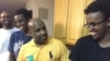 Faisal Abdi (center) stands in his kitchen along with his sons Kayse, Guleid, and Samakb after watching the third, and final, presidential debate between Republican Donald Trump and Democrat Hillary Clinton at his home in Woodbridge, Virginia, on October 19.