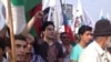 Azerbaijani opposition leader Ali Kerimli's son Turkel attends an opposition rally in Baku on September 22.