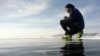 More than 100 people ran the marathon across Russia's Lake Baikal.
