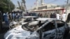 WATCH: Pakistani security forces race to seal off the Chinese Consulate in Karachi after a suicide attack on the building on November 23. 