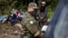 Migrants believed to be from Afghanistan on the Poland-Belarus border on August 20. (file photo)