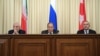 Орусия, Иран жана Түркиянын башкы дипломаттары Сергей Лавров, Жавад Зариф жана Мевлүт Чавушоглу. 