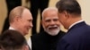 Премьер-министр Индии Нарендра Моди разговаривает с президентом России Владимиром Путиным и главой Китая Си Цзиньпином в преддверии саммита Шанхайской организации сотрудничества (ШОС) 2025 года в Тяньцзине, Китай, 1 сентября 2025 года