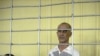 "Police would not beat a 60-year-old man, would they?" human-rights activist Azimjan Askarov asked in court in Nooken.