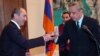 Armenia - President Robert Kocharian (L) and Foreign Minister Vartan Oskanian at an official ceremony in Yerevan, 29Dec2007.