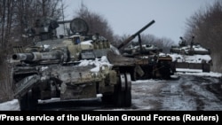 Destroyed Russian tanks are seen amid Russia's invasion of Ukraine in the Sumy region on March 7. 