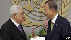 Palestinian leader Mahmud Abbas (left) delivers a letter requesting recognition of Palestine as a state to Secretary-General Ban Ki-moon during the 66th session of the General Assembly at United Nations headquarters in New York on September 23.