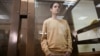 Evan Gershkovich appears for a court session at the Moscow City Court in Moscow on September 19.