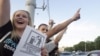 Protesters take part in a rally against a rise in gasoline prices in Minsk in June.