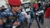 Armenia -- Riot police arrest an anti-government protester in Yerevan, 5Nov2013