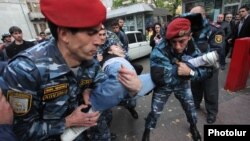 Armenia -- Riot police arrest an anti-government protester in Yerevan, 5Nov2013