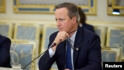 "Russia's attempts to interfere in U.K. politics are completely unacceptable and seek to threaten our democratic processes," Foreign Secretary David Cameron said.