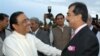 Zardari (left) with Prime Minister Yousaf Raza Gilani after Zardari's election as president