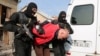 Armenia - Security forces detain a man in a raid on a house in Yerevan's Nork district, 25Nov2015.