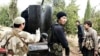 Обсуждаемое в социальных сетях фото «неизвестных азиатов, воюющих на стороне сирийских повстанцев».