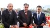 Tajik President Emomali Rahmon (center) with his son Rustami Emomali (left) in December