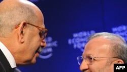 El-Baradei (left), with Iranian Foreign Minister Manuchehr Mottaki in Davos in late January, says Tehran has stopped cooperating in recent months