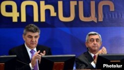 Armenia - President Serzh Sarkisian (R) and Russian-Armenian businessman Ara Abrahamian attend the 2nd convention of the World Armenian Congress (WAC) in Yerevan, 15Oct2012.