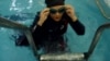 Female Iranian Athlete Bucking Official Tide Over 'Record' Swim