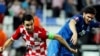 Cavid Huseynov (right) is an established international footballer, making 45 appearances for his country. 