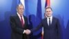 Alongside Russian Foreign Minister Sergei Lavrov (left), Serbian Foreign Minister Nikola Selakovic (right) announced his signing of a "Plan of Consultations" with Moscow on September 23. (file photo)