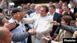 Armenia - Prosperous Armenia Party leader Gagik Tsarukian is greeted by supporters during an campaign rally in Vanadzor, 1May2012.