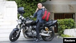 Greek Finance Minister Yanis Varoufakis arrives for a meeting at the office of the prime minister in Athens in July 2015.