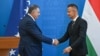 Милорад Додик (лево) на прес-конференција со унгарскиот министер за надворешни работи Петер Сијарто, Будимпешта, 4 септември 2025 година.