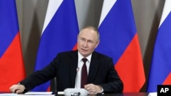 Владимир Путин