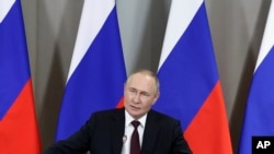Владимир Путин