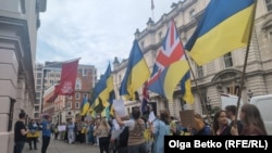 Protesters demonstrate outside the Royal Opera House in London on September 7. 