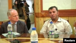 General Abdul Raziq (right) in Kandahar on October 18, shortly before he was killed in the attack.
