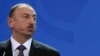 Azerbaijan's President Ilham Aliyev attends a press conference following a meeting with German Chancellor Angela Merkel at the Chancellery in Berlin on January 21.
