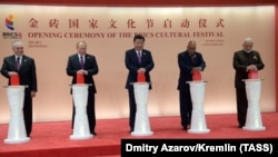 Brazil President Michel Temer (left to right), Russian President Vladimir Putin, Chinese President Xi Jinping, South African President Jacob Zuma, and Indian Prime Minister Narendra Modi attend the opening ceremony of the BRICS cultural festival in Xiamen on September 4.