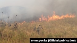 Firefighting operations by Kazakh emergency services are still under way. (file photo)
