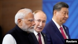 Снимката е от среща на върха през 2024 г., когато държавните глави на Индия, Русия и Китай се срещнаха в Казан, Русия. 