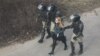Over 200 Detained In Belarus Protests Muted By Heavy Security Presence